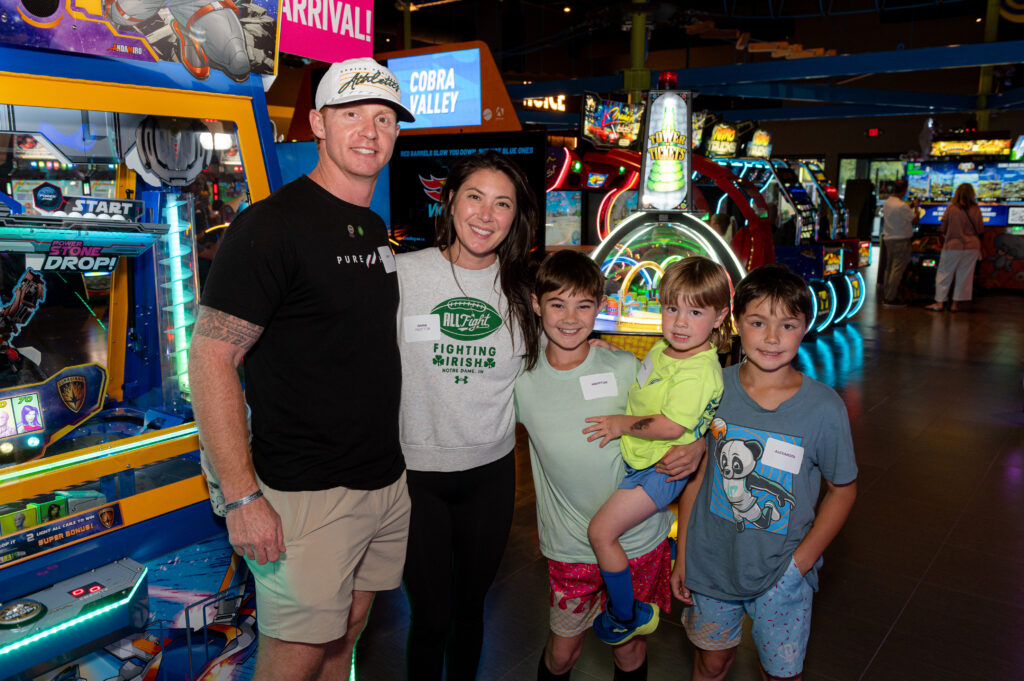 IMS team member and family at IMS' Summer Social